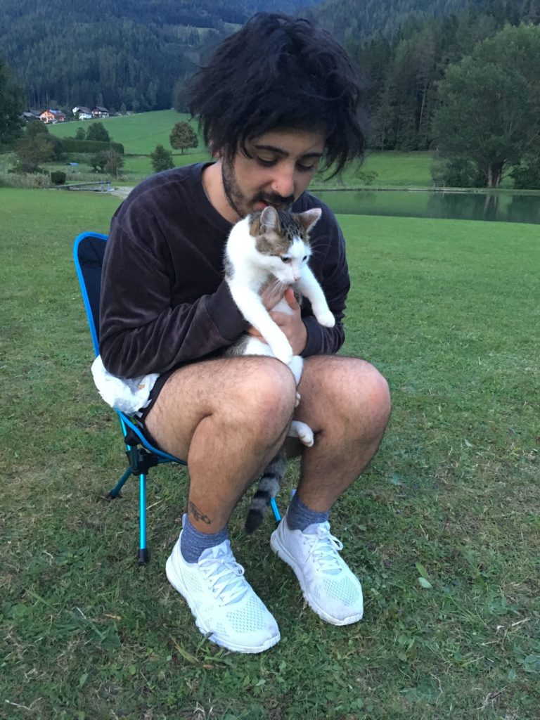 Aydin holding the campsite kitty