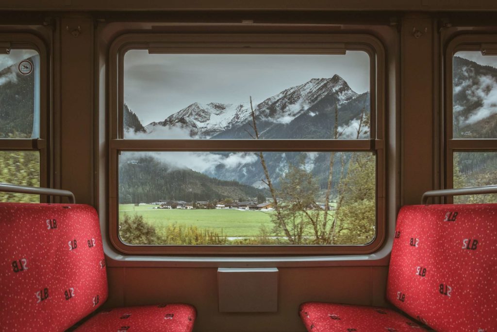 The view from the pinzgauerbahn - snowy mountains a cute village