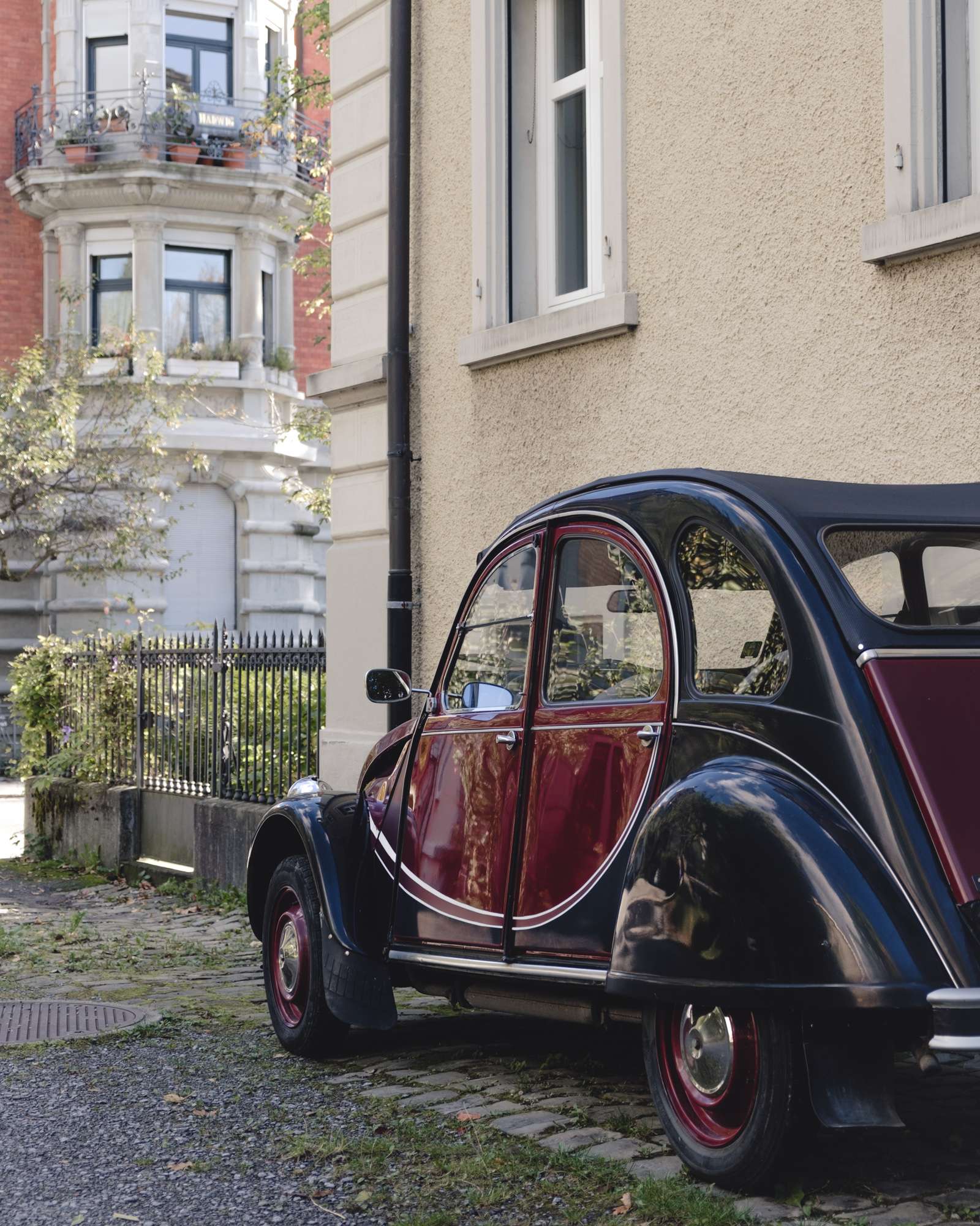 Red and black Käfer vintage car in St. Gallen