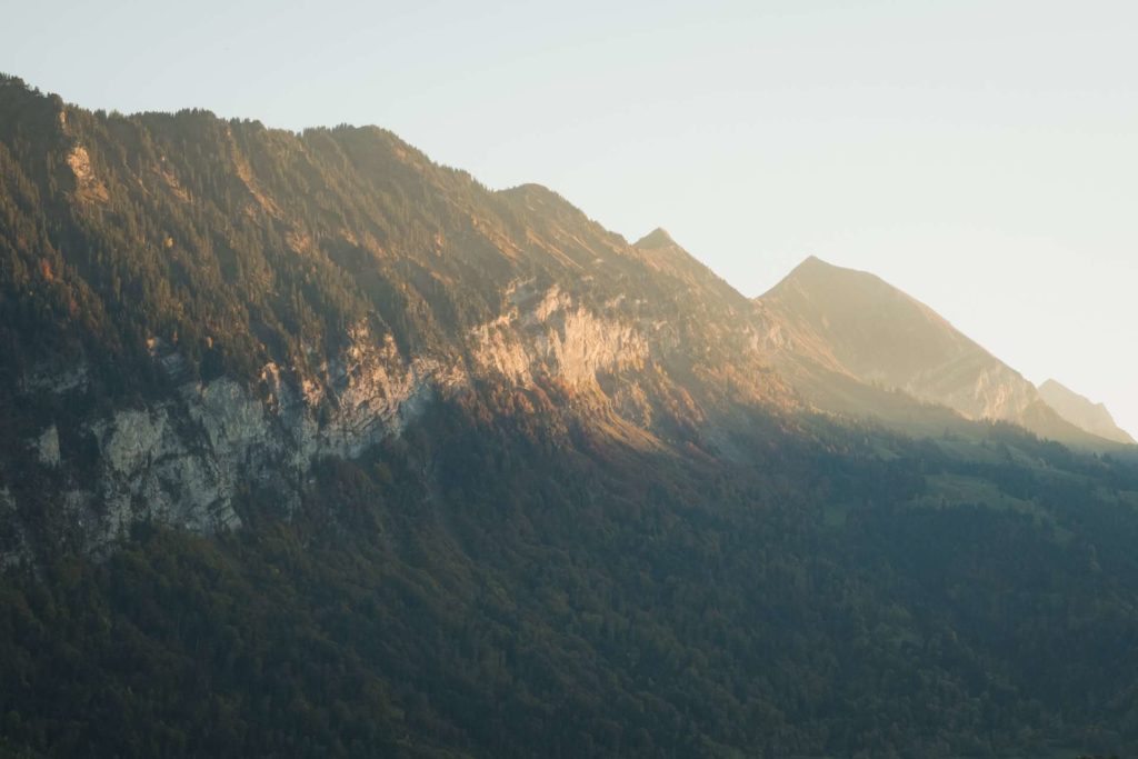 Sunset illuminating mountain ridge in Interlaken