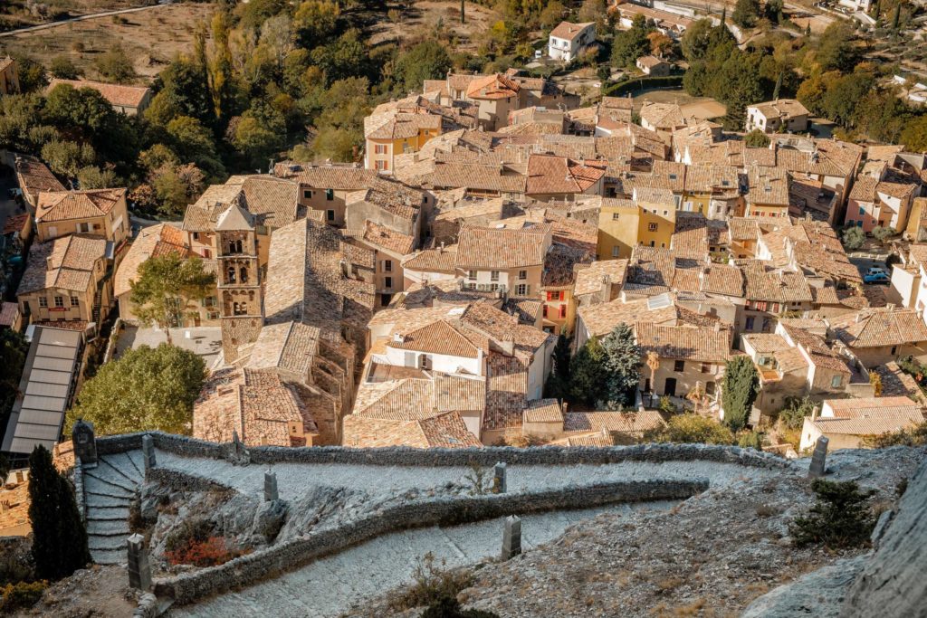 Moustiers-Sainte-Marie from above with winding path to church