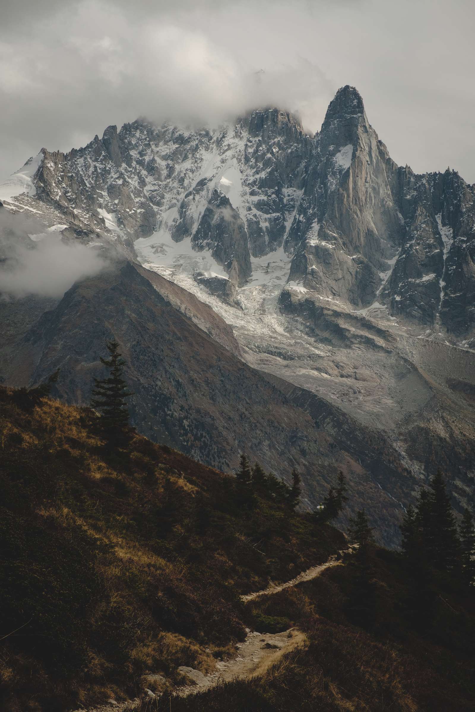 Winding path way to towering peaks of Mont Blanc