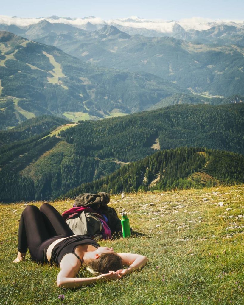 Caroline lying taking a break around half way up Dachstein