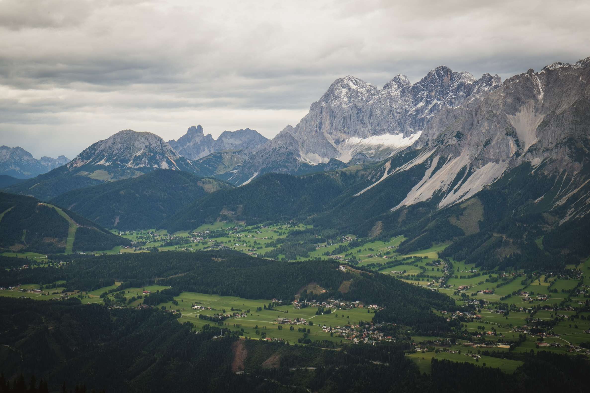 Schladming and the surrounding valley with the towering Dachstein mountains in the background