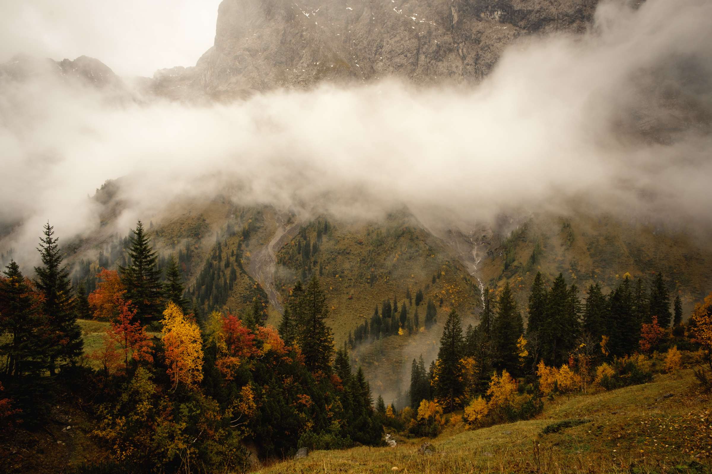 Clouds and waterfalls engulfing the Karwendel valley