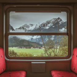 The view from the pinzgauerbahn - snowy mountains and a cute village