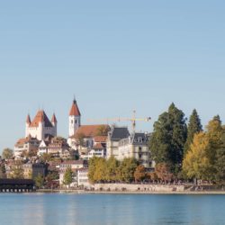 Thun with wide expansive river in the foreground