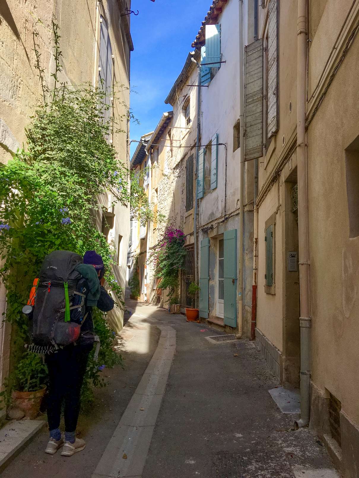 Aydin photographing side street in Arles