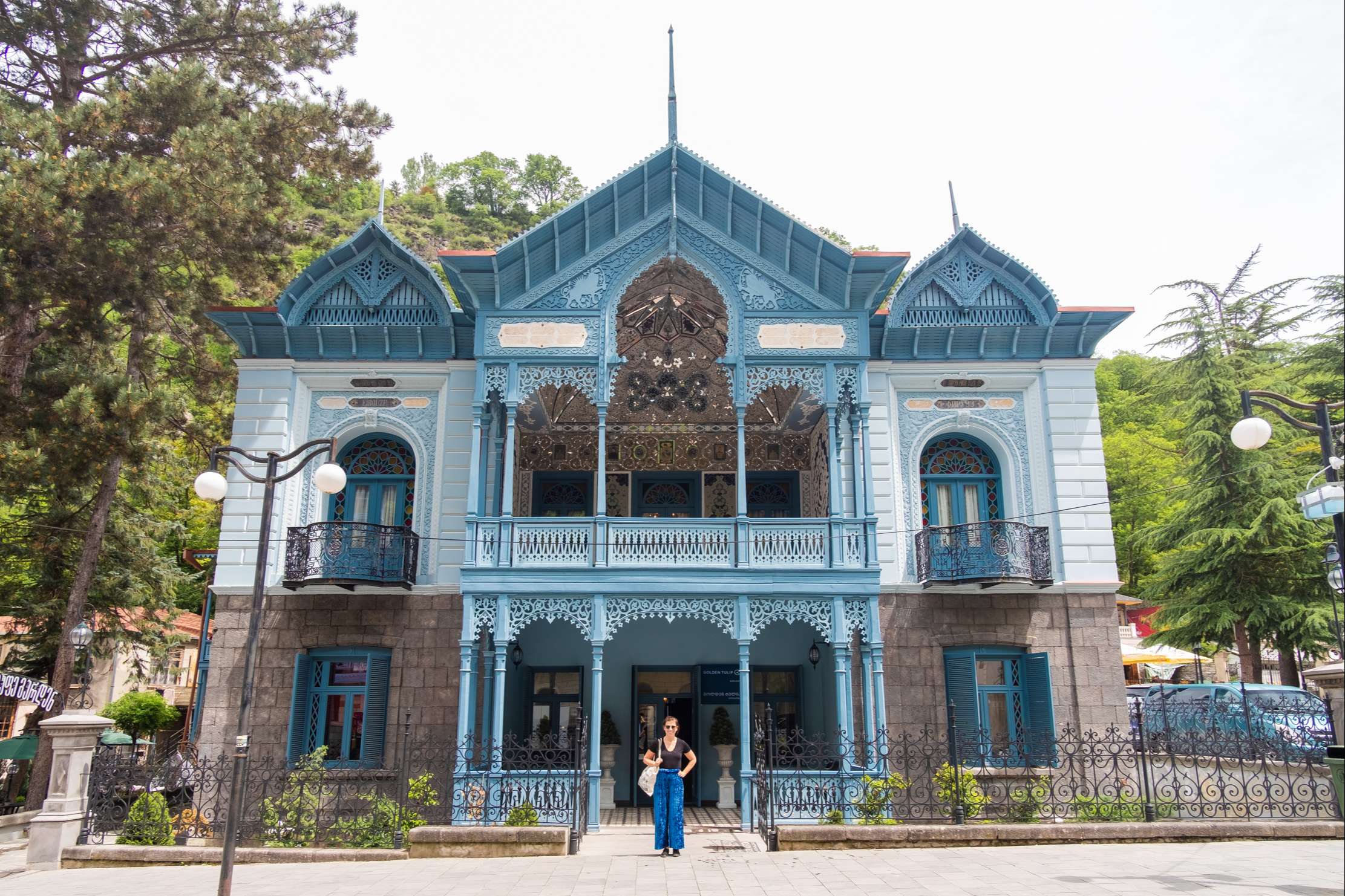 Caroline in front of Blue Palace Firuza, Borjomi, nowadays Golden Tulip Hotel