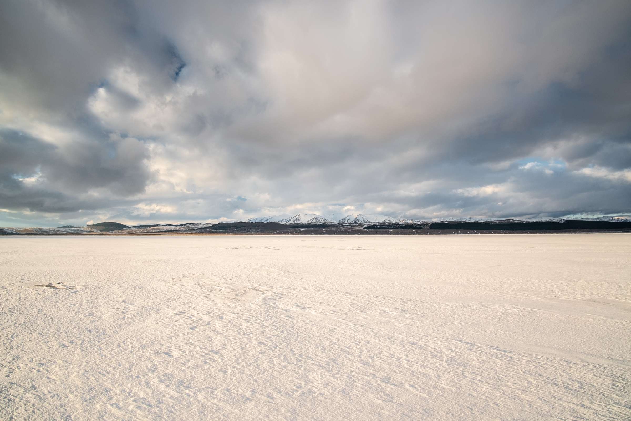 Tsalka reservoir frozen over and covered in snow