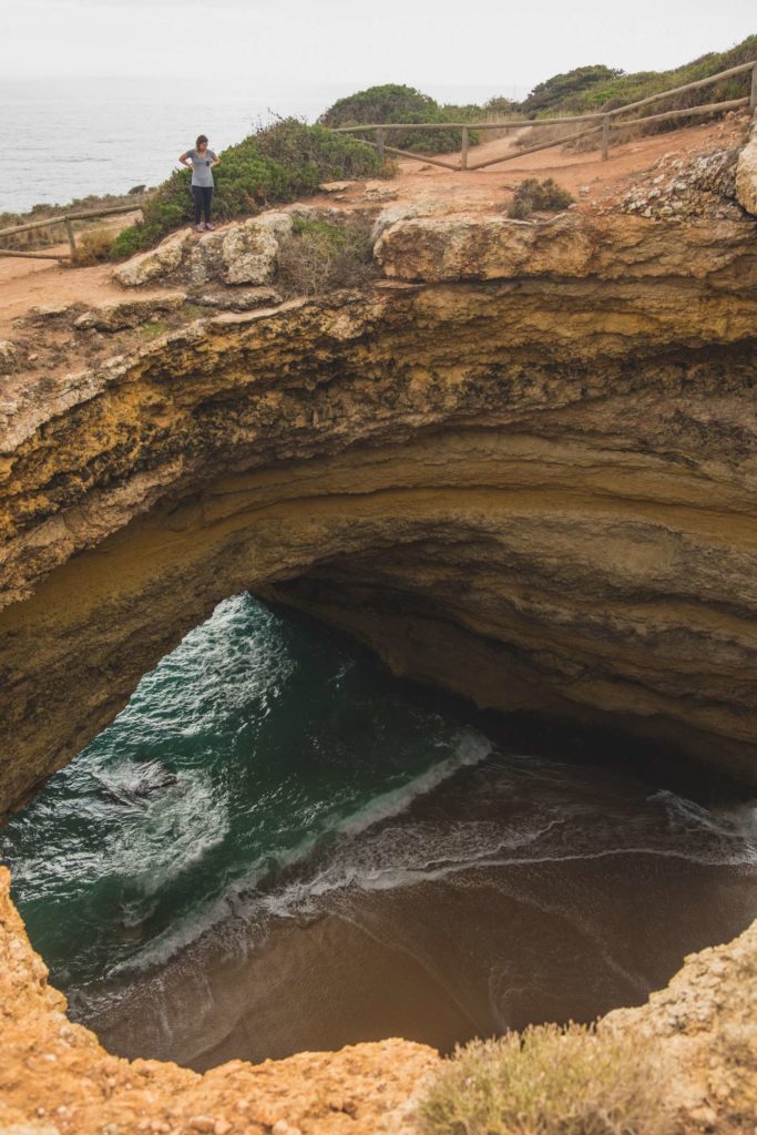 Caroline peering into Benagil Caves