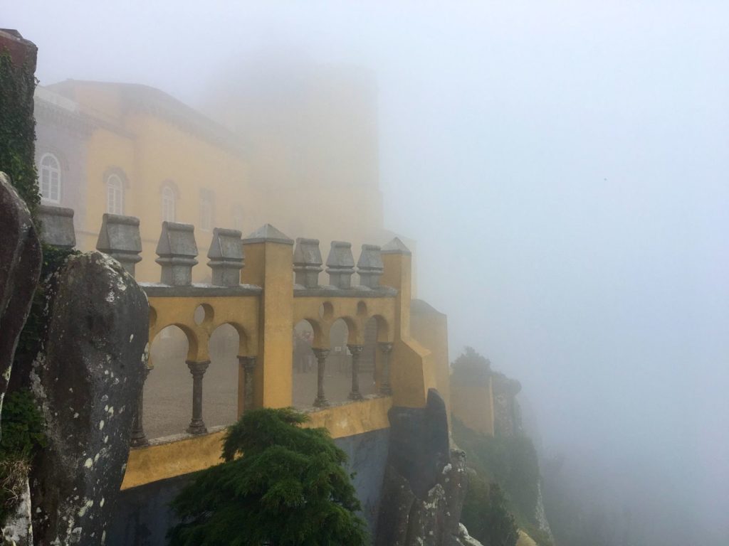 Pena palace submerged in thick fog