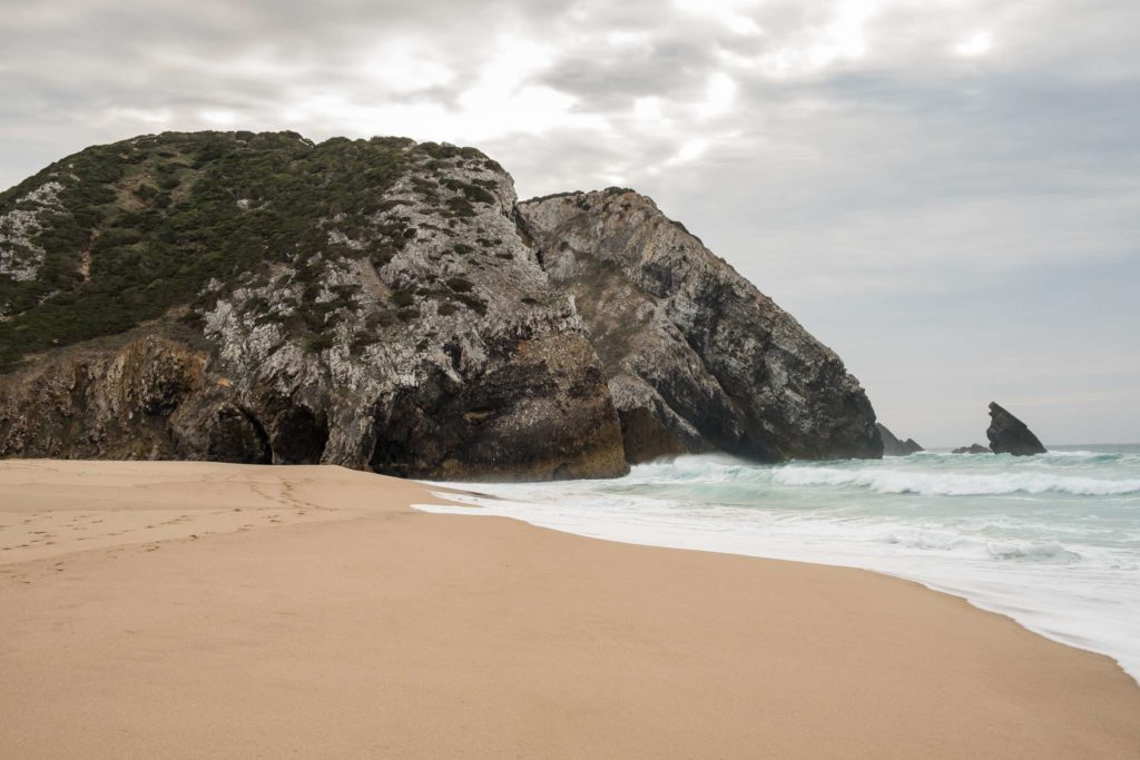 Praia da Adraga beach on a moody day, Sintra