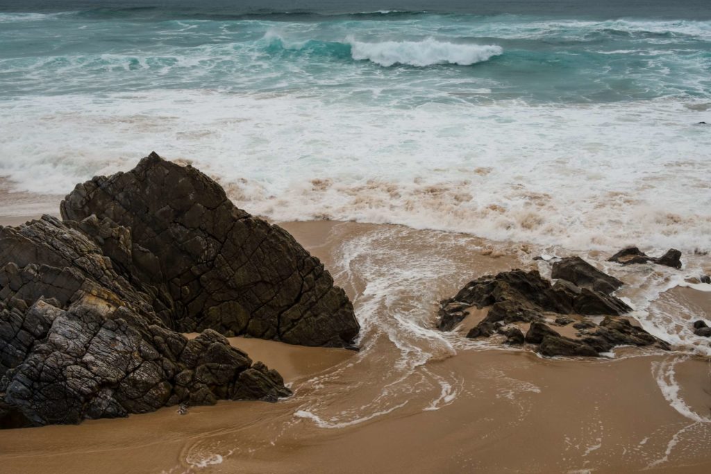 Rocks on the beach of Praia da Adraga, Sintra