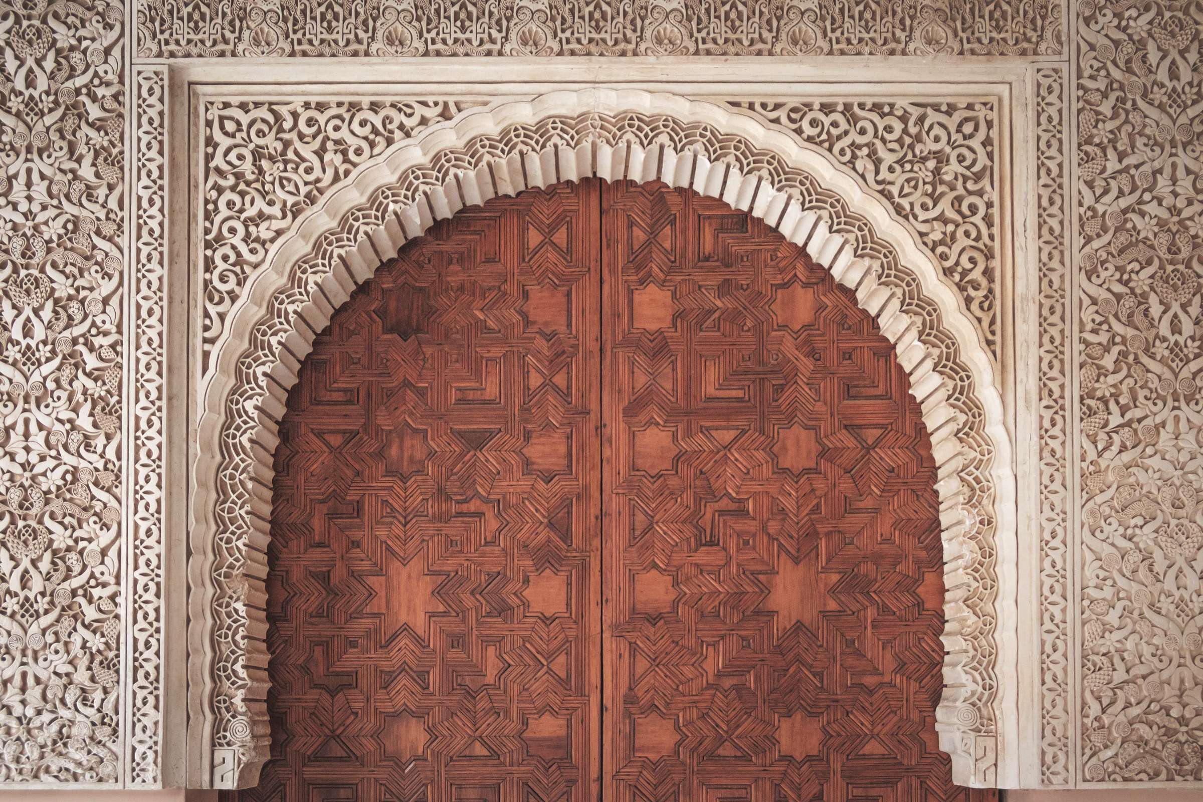 Intricately carved arched door, The Alhambra, Granada