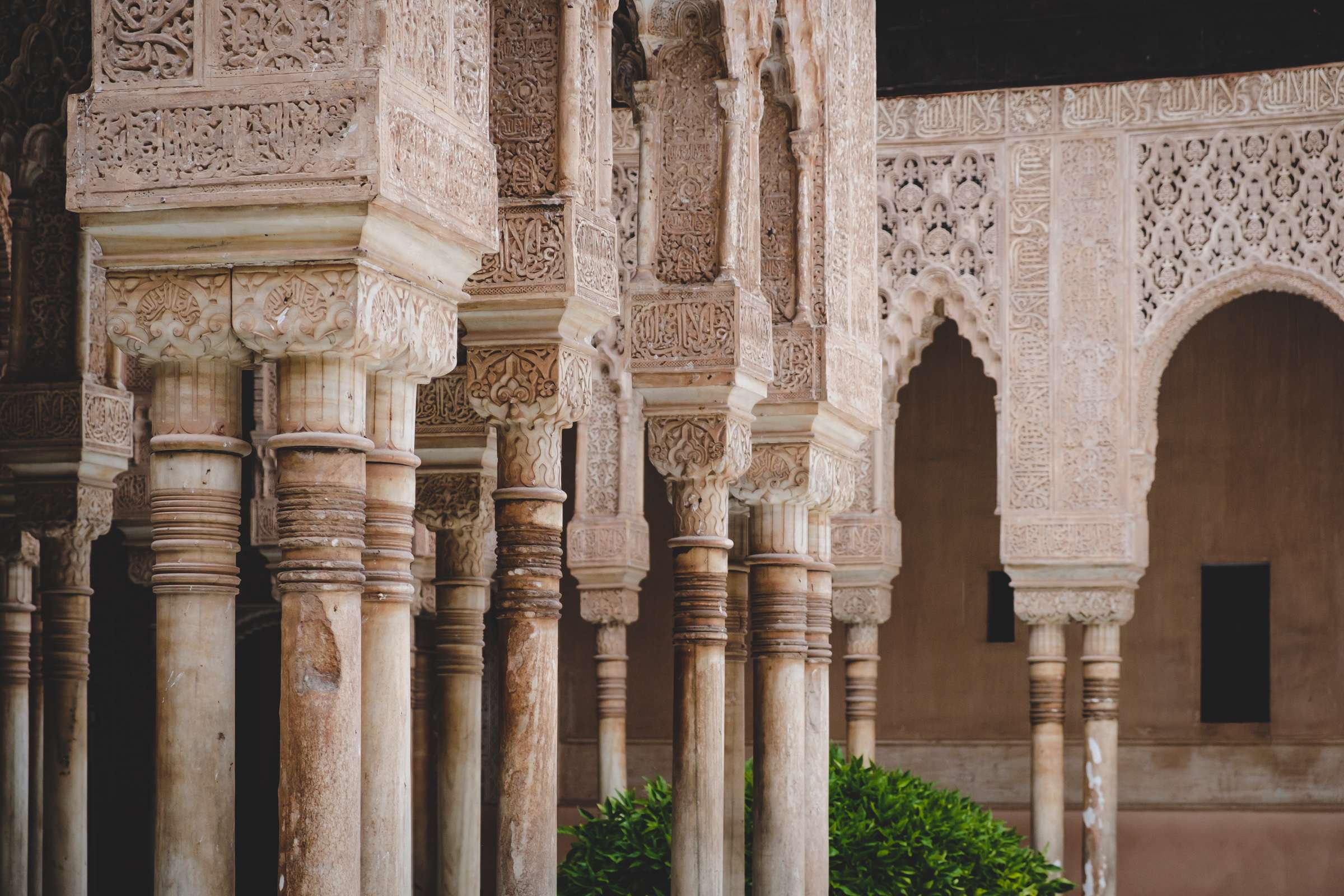 Intricately carved arches and columns, The Alhambra, Granada