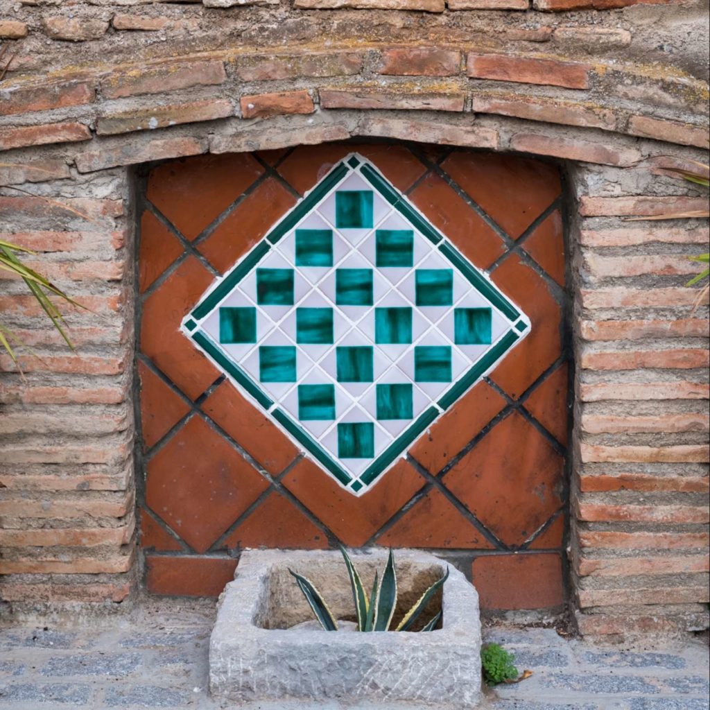 Islamic tile patterns on the street in Granada