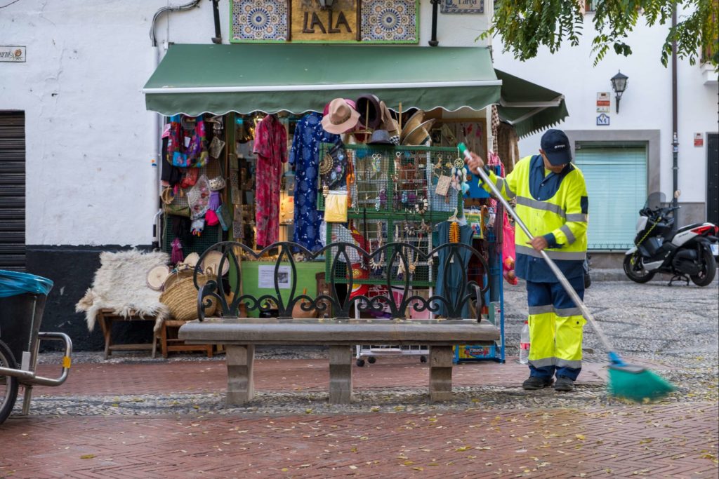 A street cleaner in the Jewish quarter of Granada