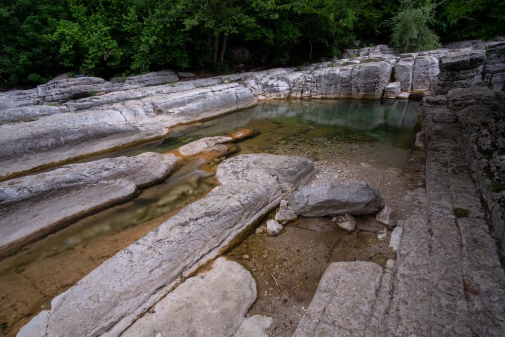 Kinchkha pools with strange square rock formations and natural square pool