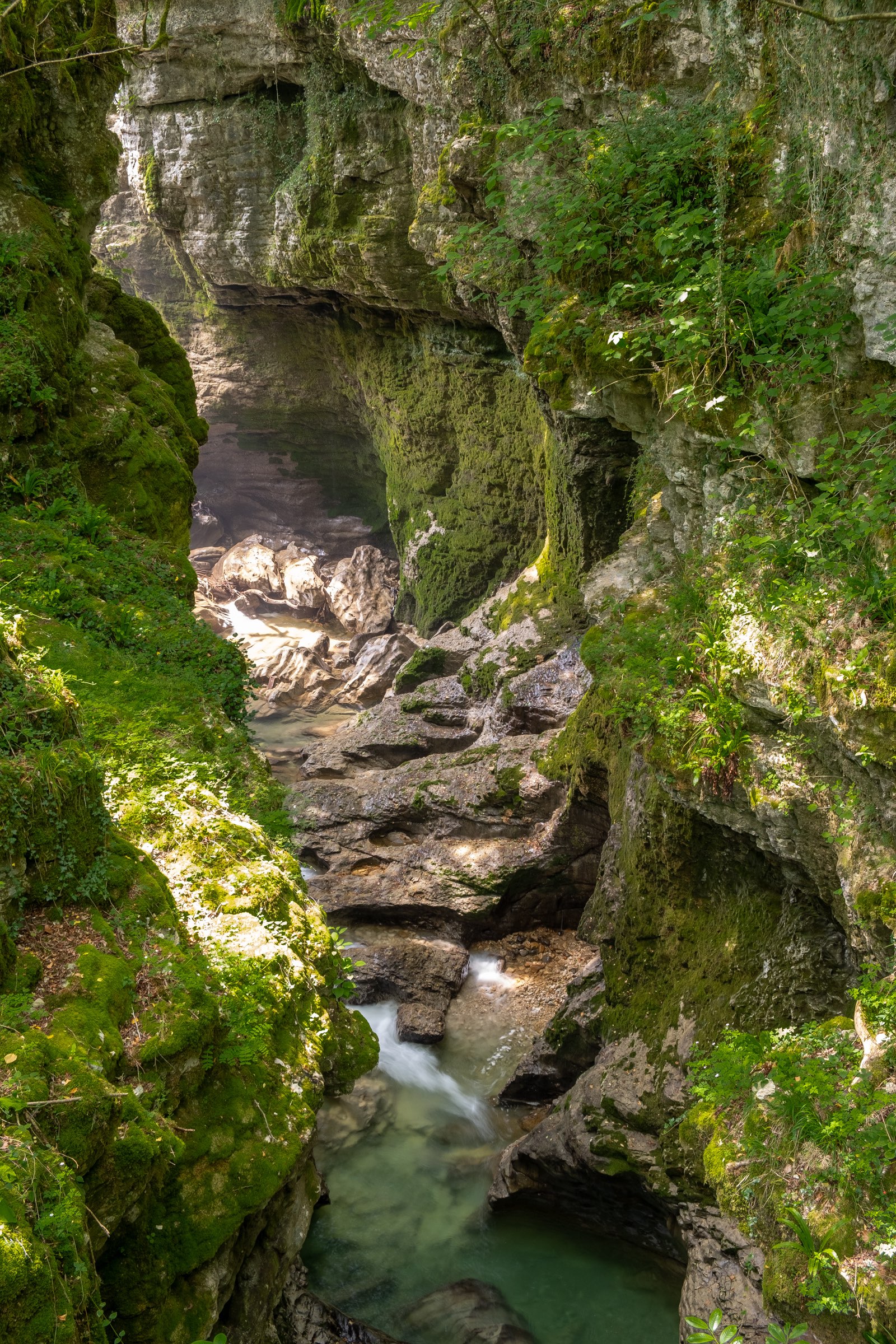 Martvili canyon with natural light flooding into the deep canyon