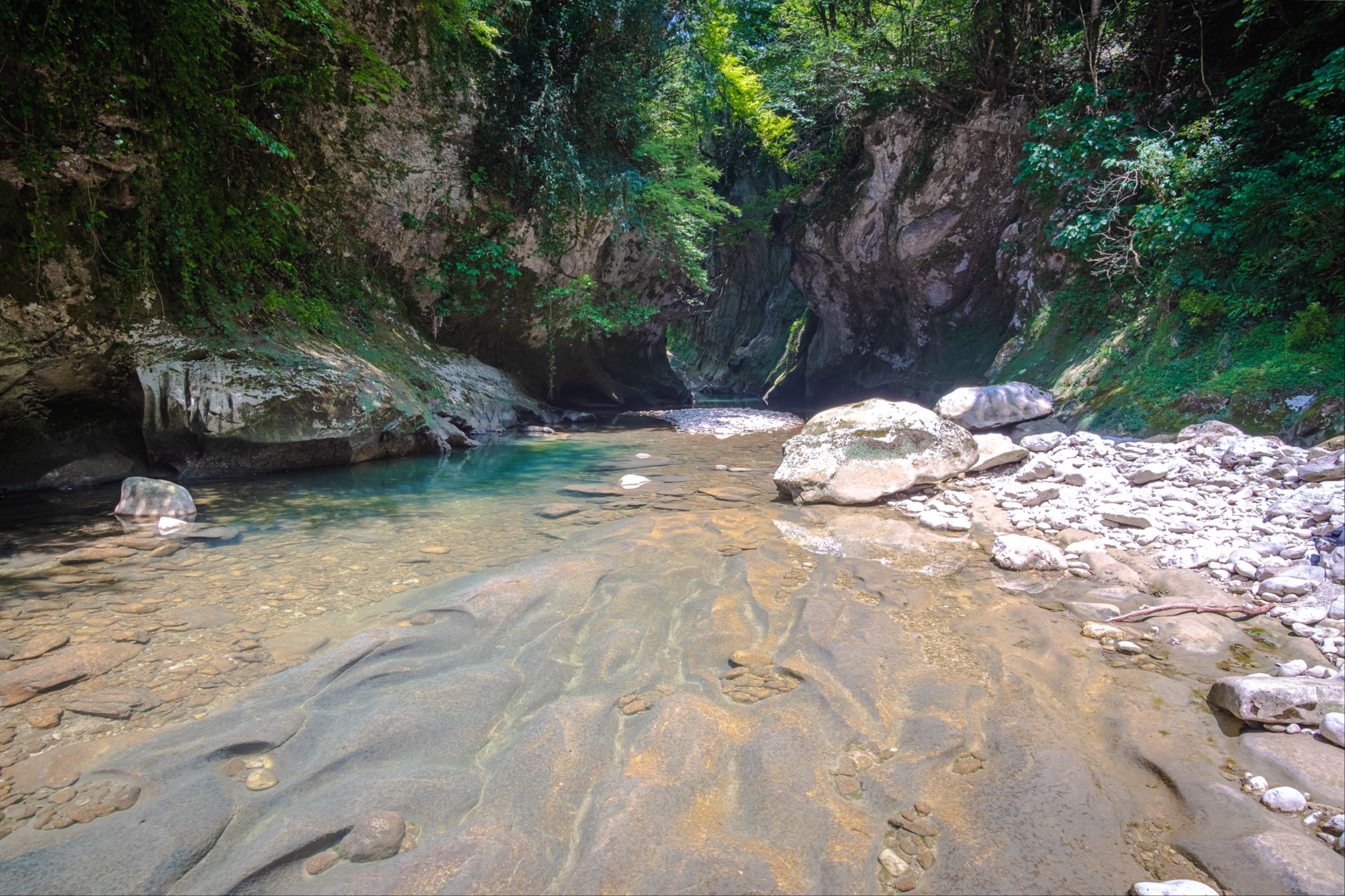 Martvili canyon with smooth snaking rock patterns in the canyon floor