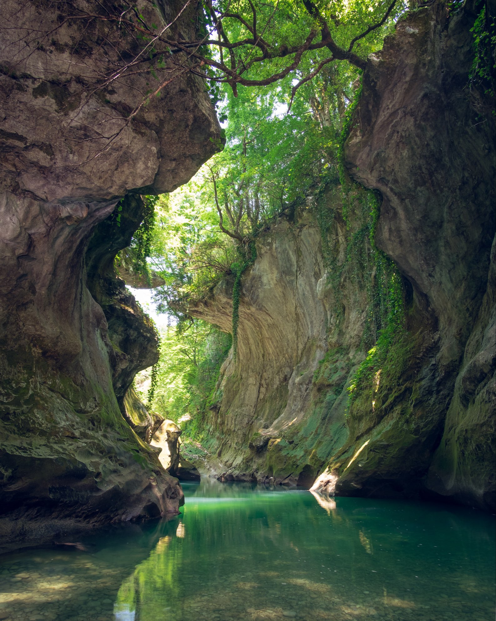 Martvili canyon with steep curved sides from within the canyon