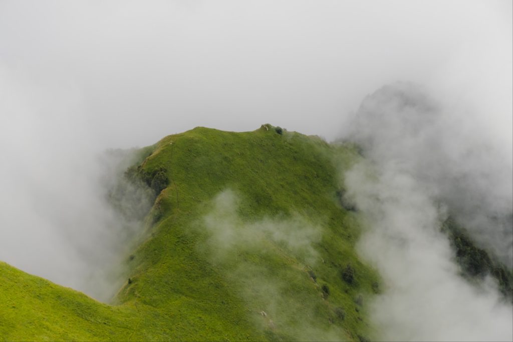 Mountain ridge hiking path protruding through the clouds in Lagodekhi Protected Areas, Georgia