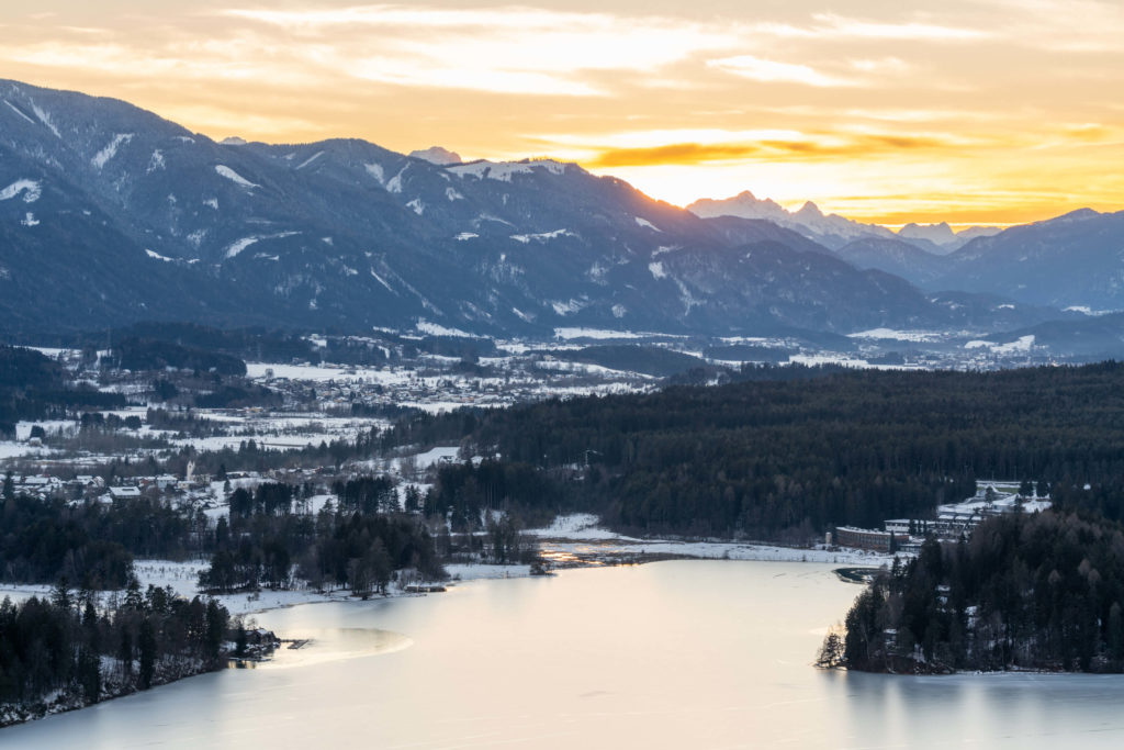 Close up winter sun setting at lake Faaker See, Villach, Carinthia