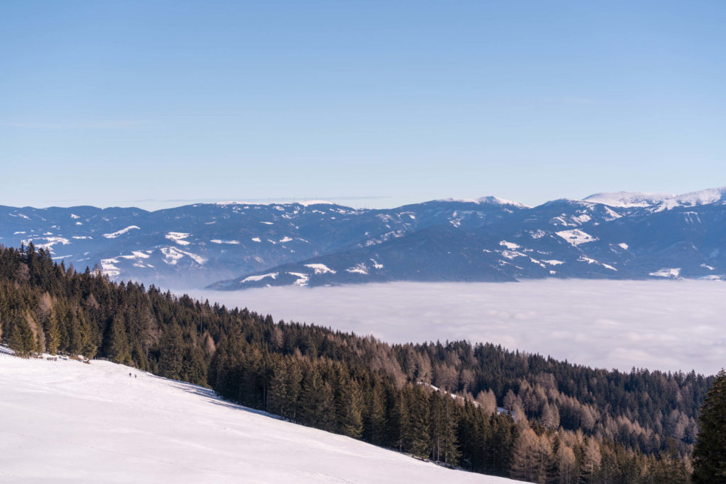 Cloud inversion on a sunny afternoon from Saualpe, Lavanttal, Carinthia