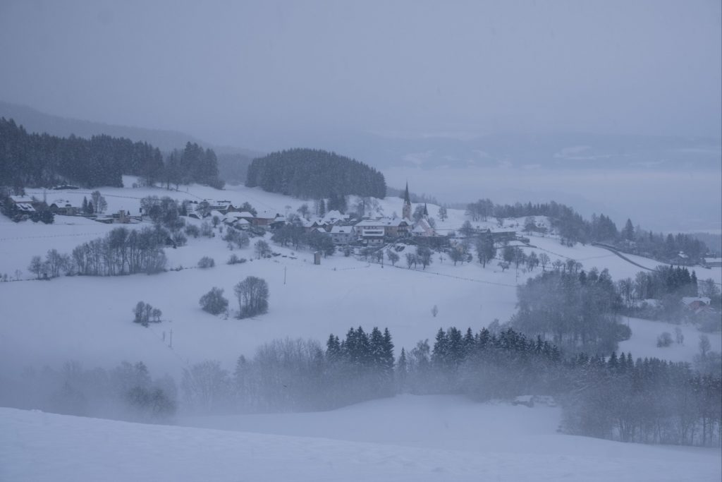 Foggy village of Sörg in the middle of winter