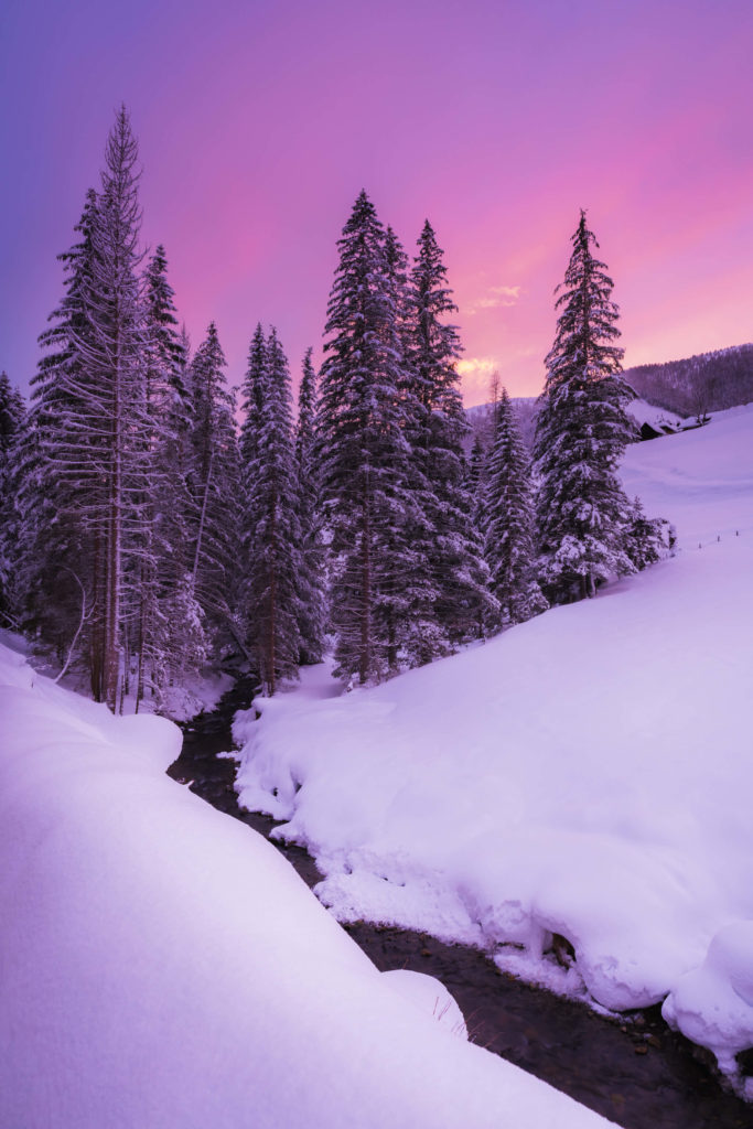 Magnificent pink and purple winter sunset in the snowy landscape of Bad Kleinkirchheim, Carinthia