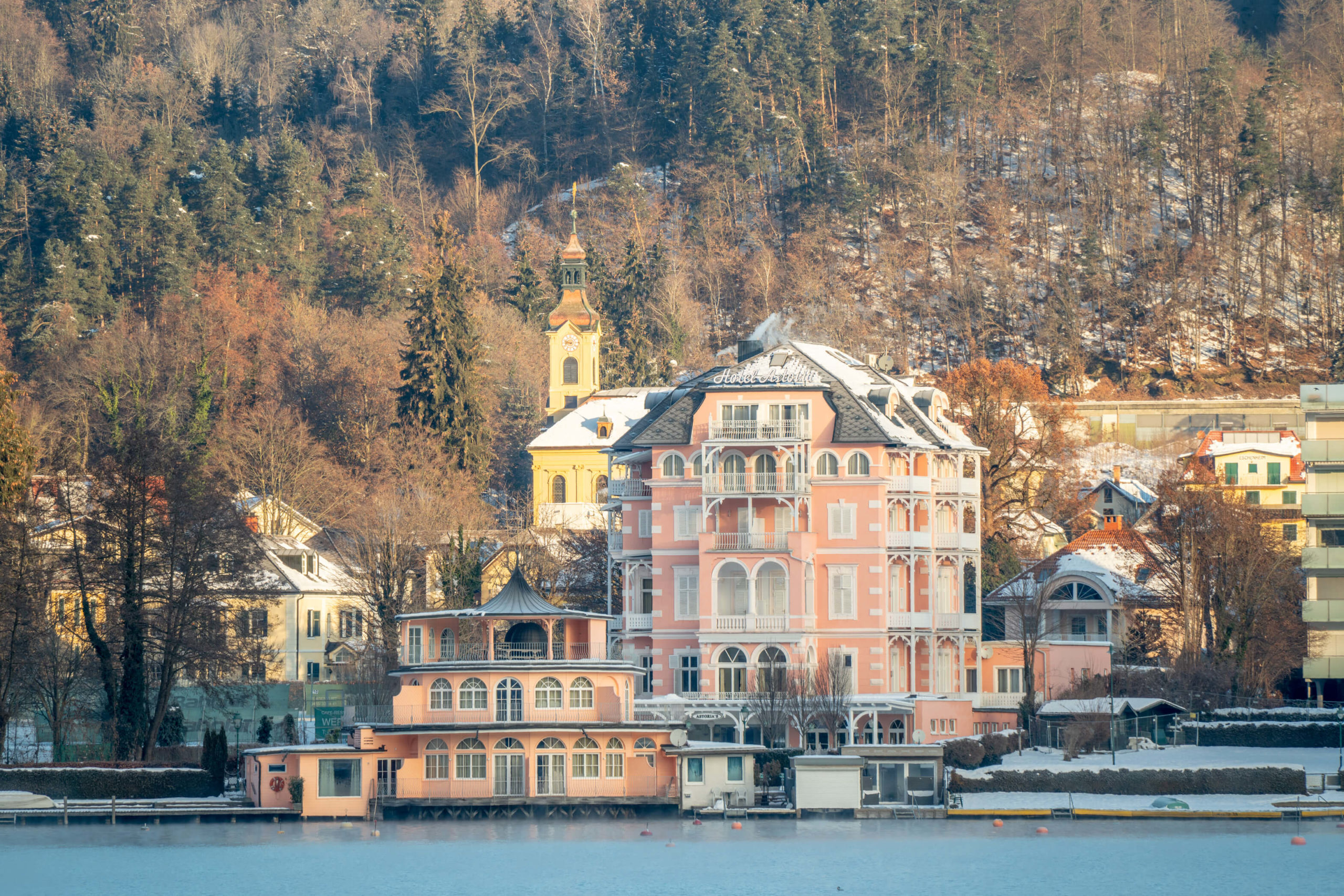 Cute pastel coloured hotels on lake Wörthersee, Carinthia