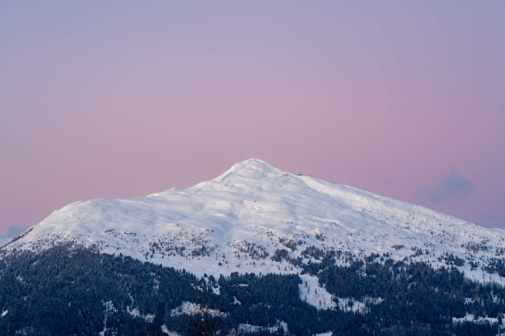 Pastel pink winter sunset at Speiereck mountain near Katschberg, Carinthia