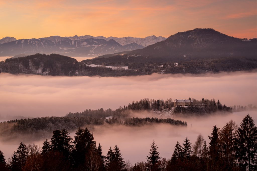 Castle/Schloss Hohenstein during a fiery and foggy winter sunrise