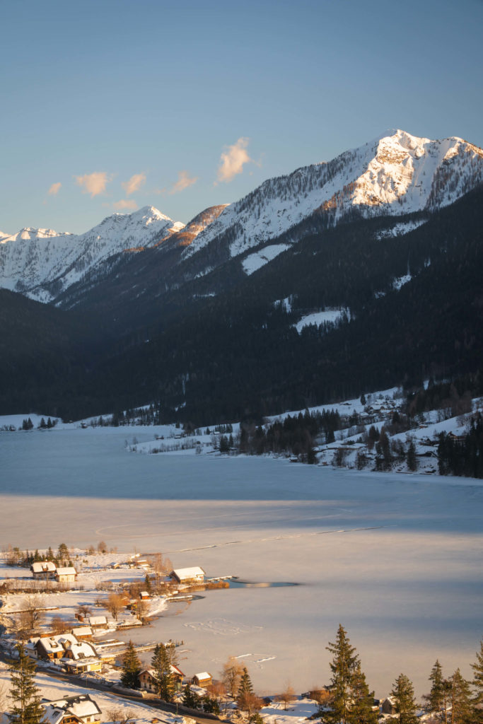 Snow covered Weissensee from above in afternoon light, Carinthia