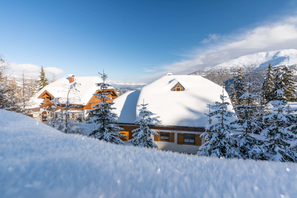 Snowy houses in winter at Katschberg, Carinthia