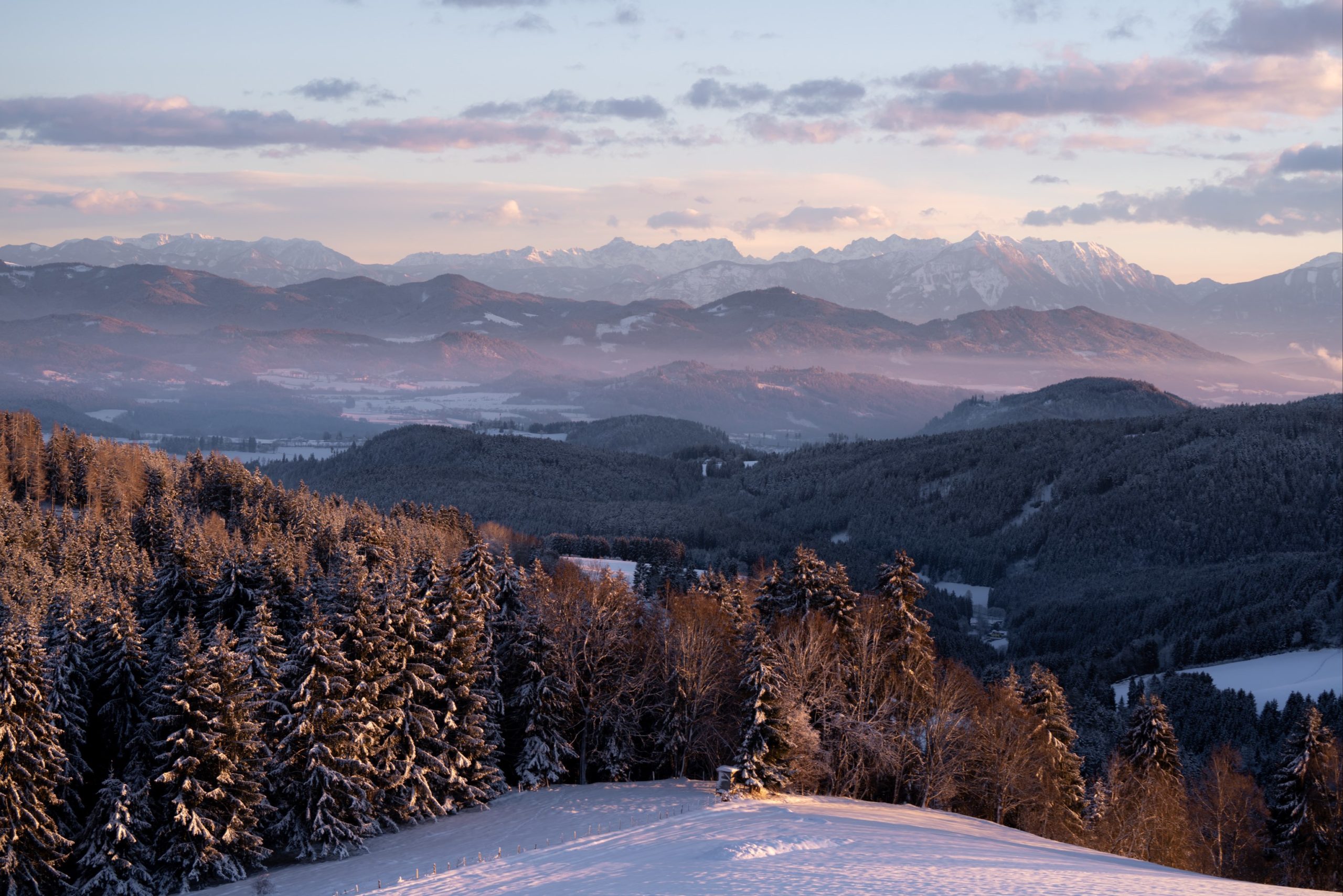Snowy sunset over the Karawanken mountains, the border of Austria and Slovenia, from Gunzenberg, Carinthia, Austria