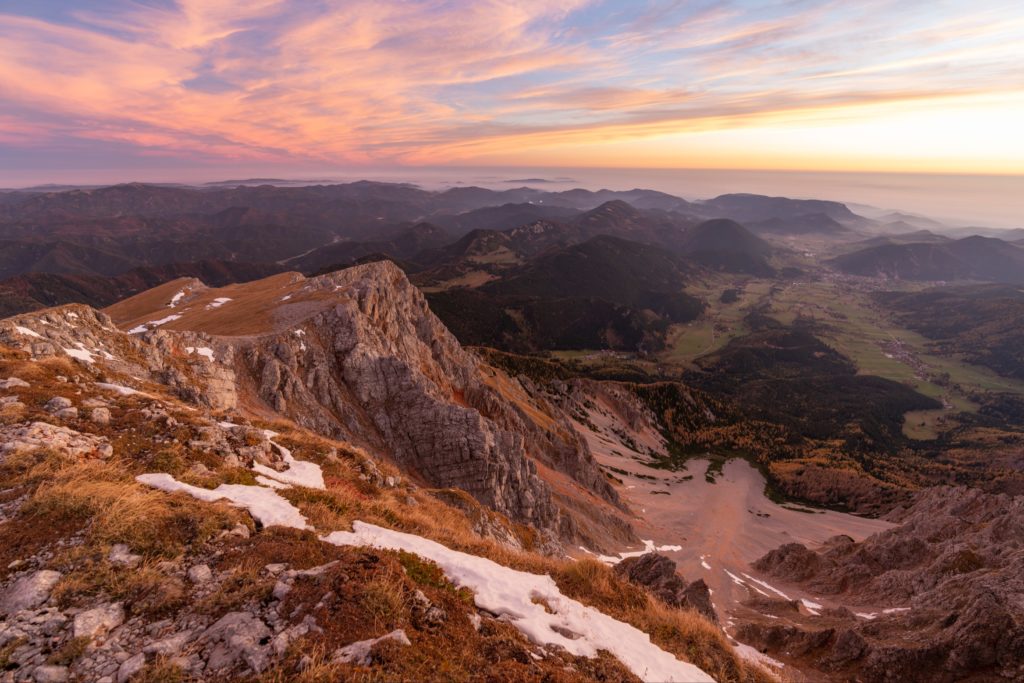 Magical sunrise from Schneeberg with vibrant autumn colours and bare steep rock faces