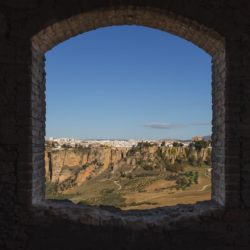 Ronda through abandoned window