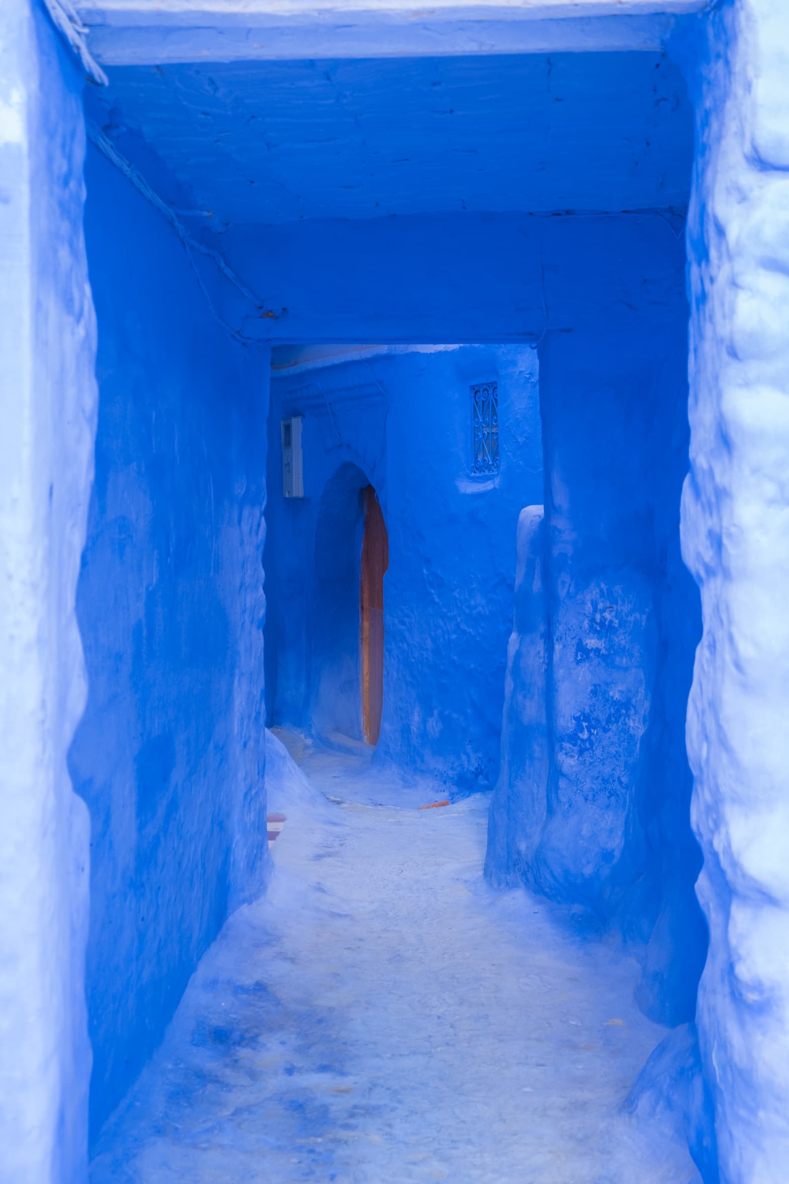A blue tunnel to a home in Chefchaouen, Morocco