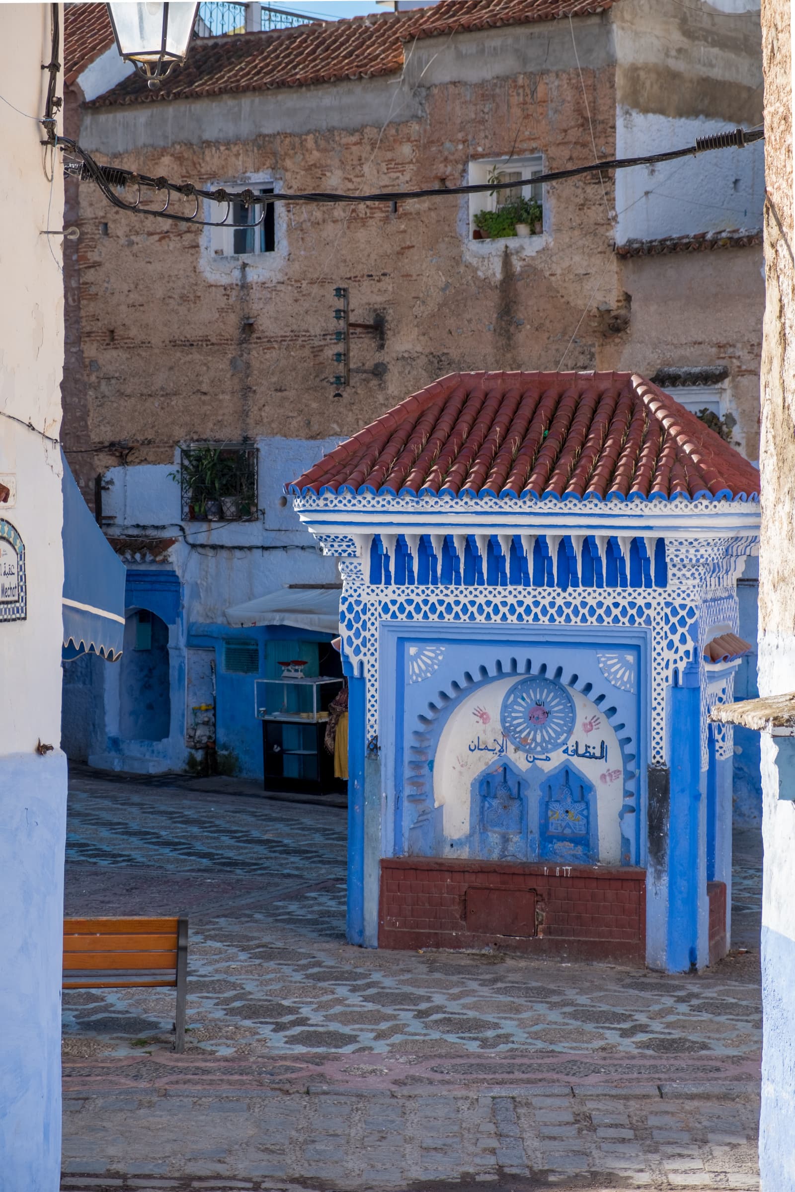 A intricately decorated fountain in Al-Hawta square, Chefchaouen, Morocco