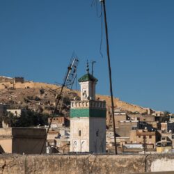 Minaret and old city walls from a rooftop in Fez, Morocco