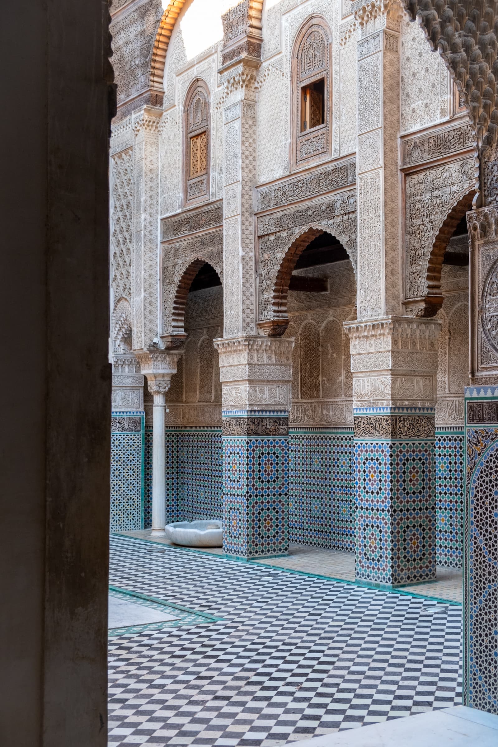 Arches, columns and mosaics in University of al-Qarawiyyin, Fez