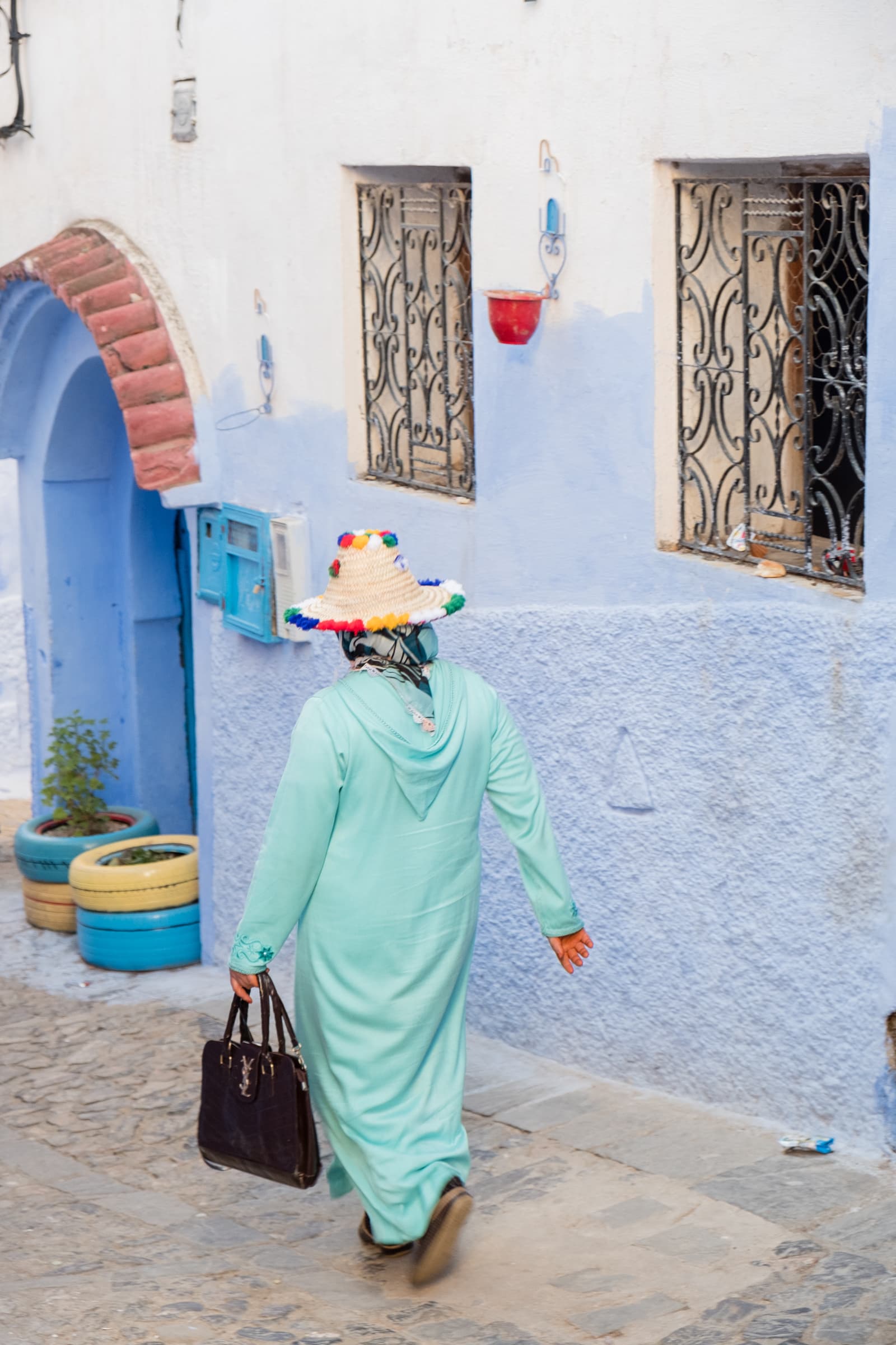 Woman in traditional Berber dress, Chefchaouen, Morocco