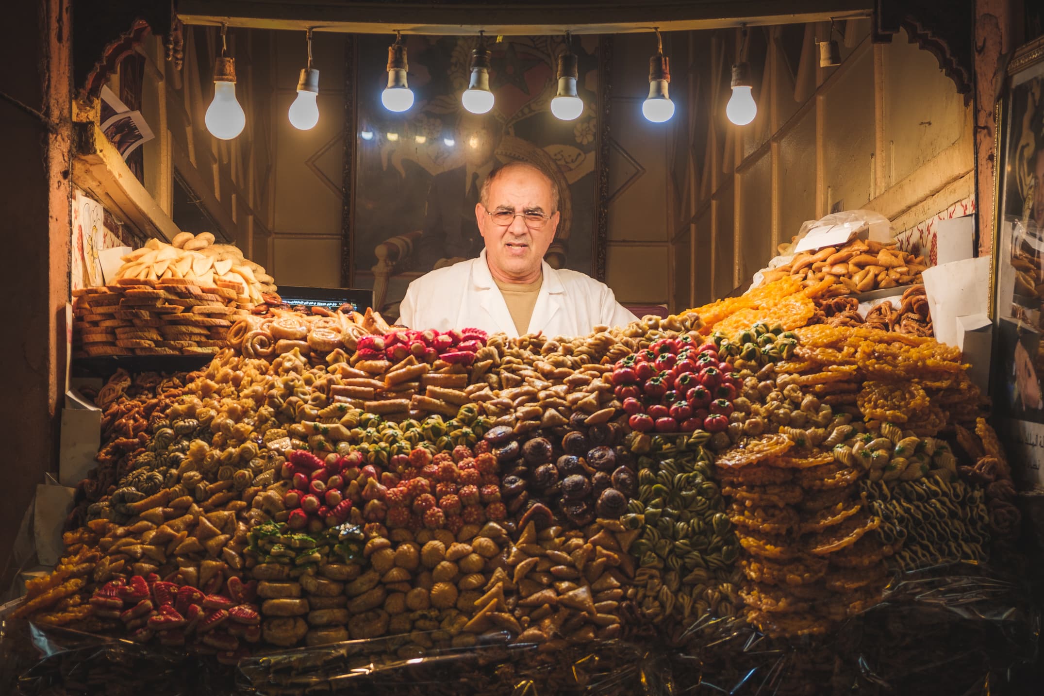 A sweet seller in a bazaar in Marrakesh