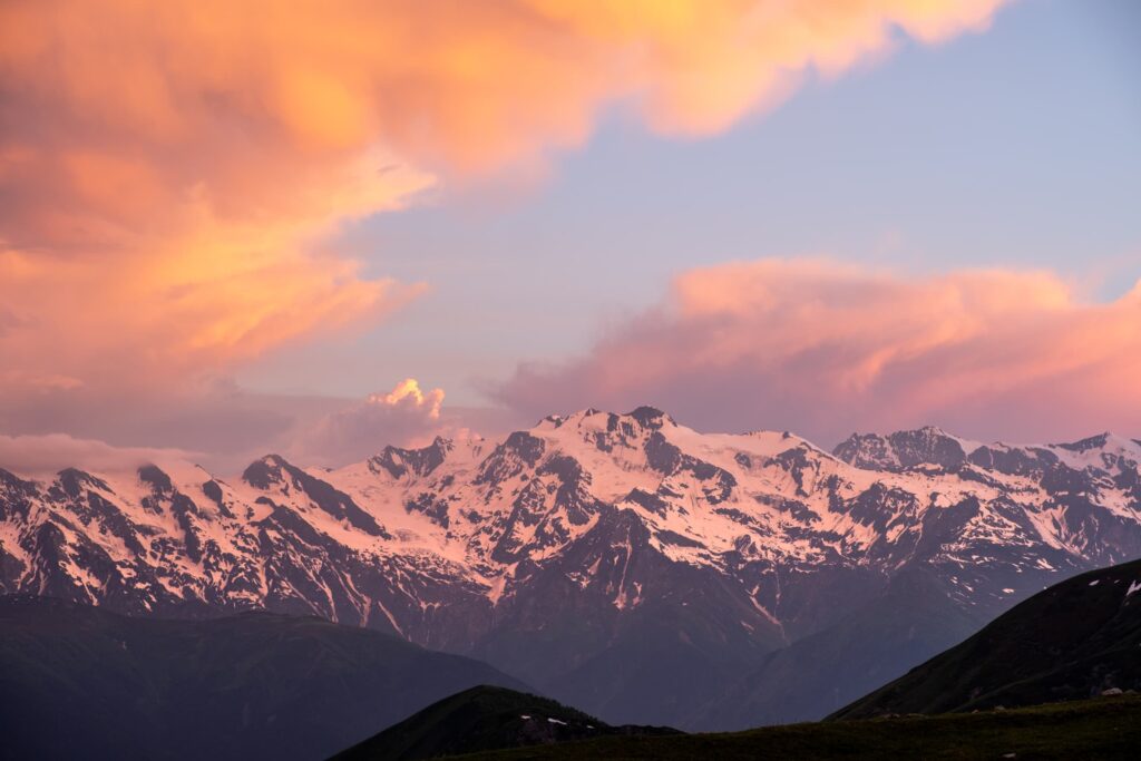 Candy clouds and snowy mountains