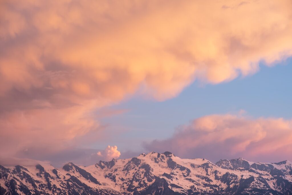 Candy clouds and snowy peaks