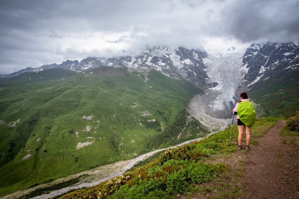 Caroline at the top of Chkhunderi pass looking towards Adishi glacier, Svaneti, Georgia