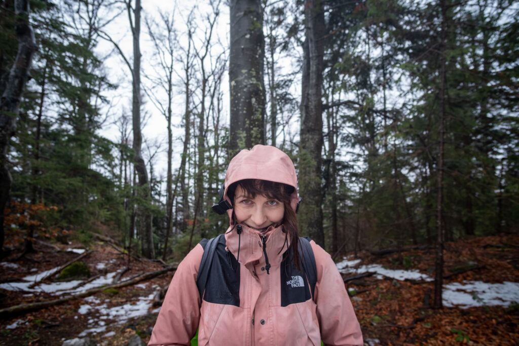 Caroline in the cold icy forest around Schneeberg