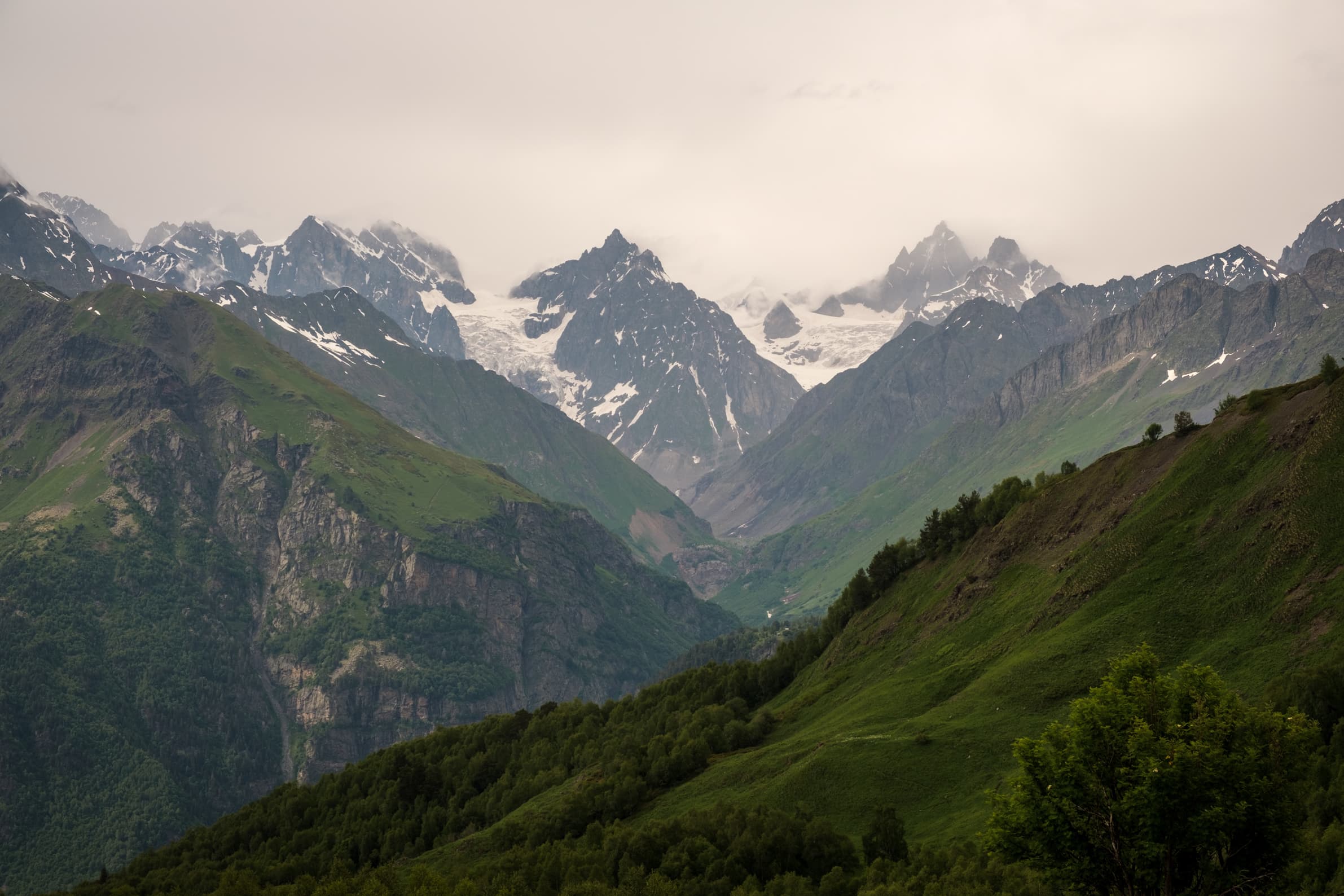 Jagged peaks and distant glaciers from mount Tetnuldi